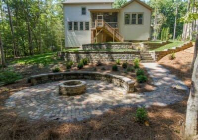 Southern Greenscapes Landscape Design & Construction | Rock Hill, SC | back yard after with fire pit, patio and retaining walls